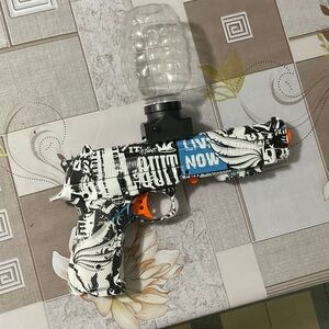 Black and White Graphic gell blaster with Blue Accents